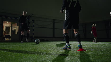 young girls soccer players practicing indoors