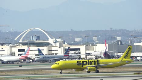 spirit airlines airplane taxiing at lax airport
