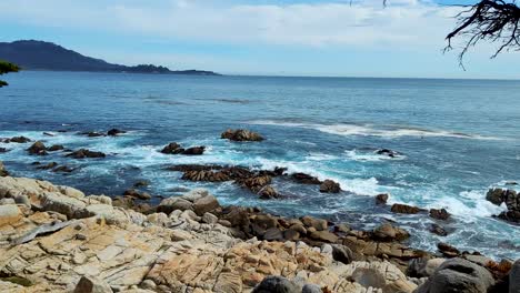 17 mile drive spanish bay in monetery, california. blue ocean waves hitting rocks at seal rock beach