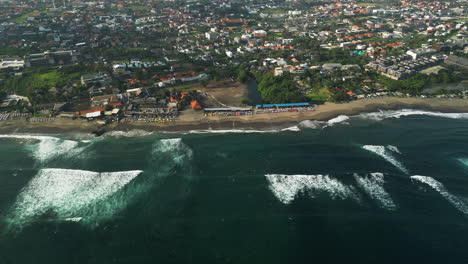 batu bolong beach in canggu, bali, famous surfer destination with big waves