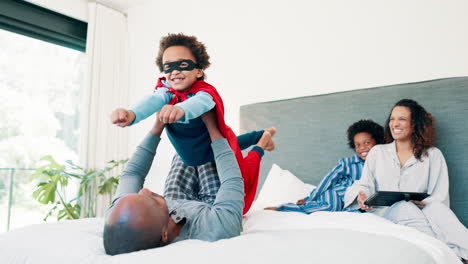 happy family playtime in bedroom