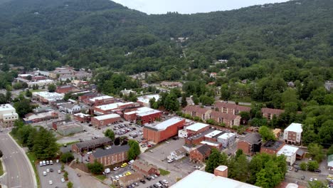 aerial push into town of boone nc, north carolina in 4k