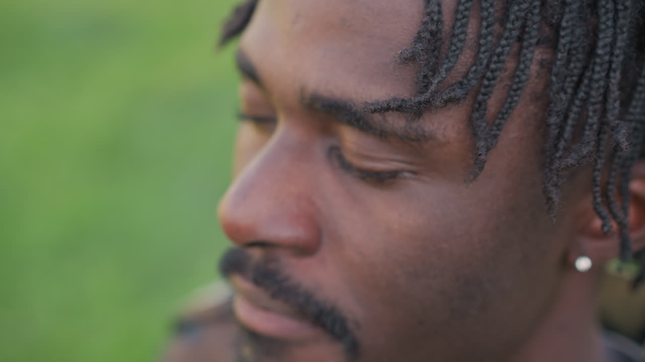 Veteran With Dreadlocks, Serene Black Soldier Portrait, Calm Profile Of Mature Man With Dreadlocks And Earring, Contemplative Image Of Seasoned Soldier With Distinctive Hairstyle And Accessories