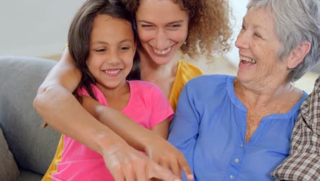 smiling family on couch