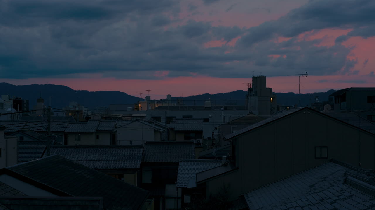 Sunset Over Japanese Suburb
Soft light fades over traditional Japanese rooftops and the distant skyline.