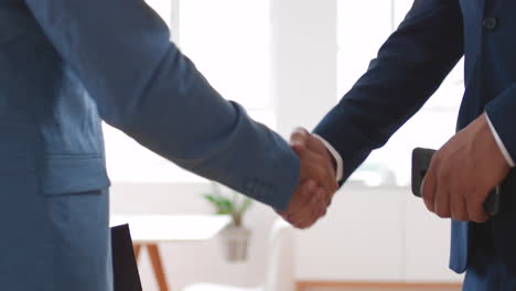 businessman, meeting and welcome with handshake