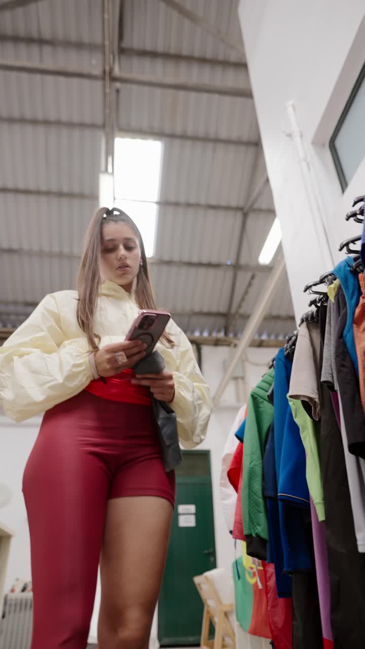 Young Woman Browsing Clothing