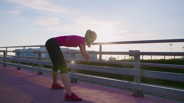 Woman Stretching Outdoors