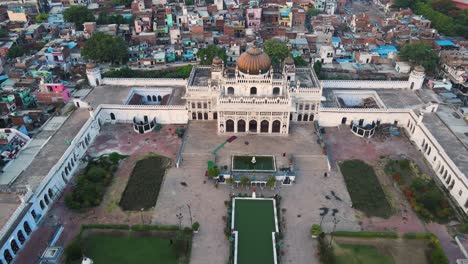 aerial capture of chota imambada in lucknow, showcasing its symmetry and historic significance at sunrise.