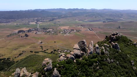 Flying-over-mountainous-landscape-surrounding-San-Luis-Obispo