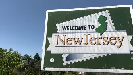 welcome to new jersey sign with video panning left to right