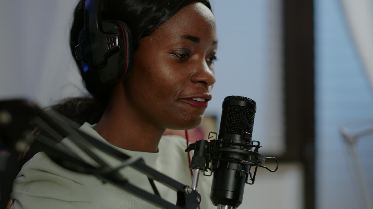 Close up of afro woman vlogger making new video blog