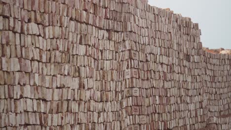 stacked bricks in a brickyard