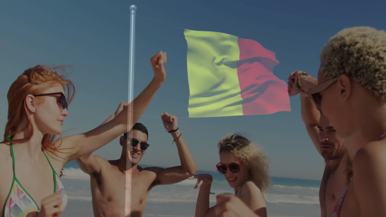 Dancing on beach, friends holding colorful flag, enjoying animation under clear sky
