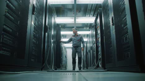 a data center technician performing maintenance and monitoring tasks within a high-tech server room, ensuring optimal performance and connectivity of network systems