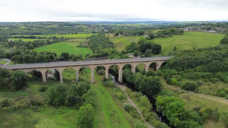 aerial flying towards newton cap viaduct in bishop auckland - county durham, uk