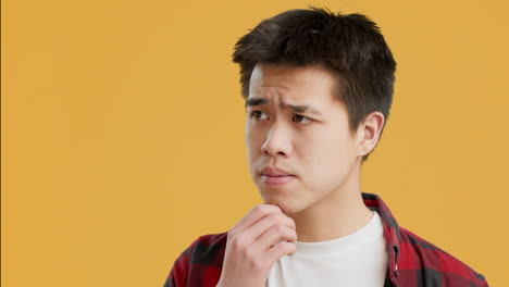 young man pondering