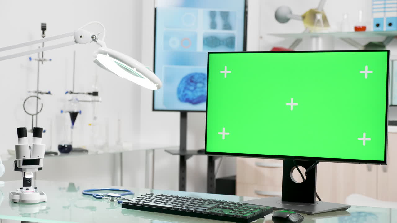 Laboratory with Green Screen Monitor and Microscope