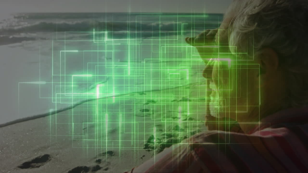 Senior man holding spyglass on sandy beach, showcasing green digital grid overlays for technology