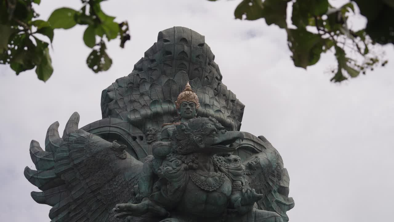 Majestic Garuda Wisnu Kencana statue in Indonesia, motion view from bellow