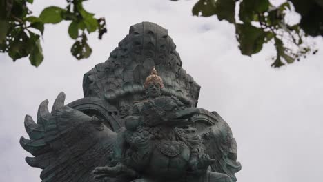 majestic garuda wisnu kencana statue in indonesia, motion view from bellow