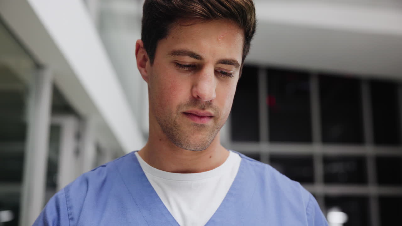 A healthcare worker in scrubs