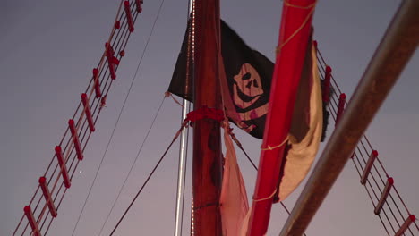 old wooden pirate ship out at sea