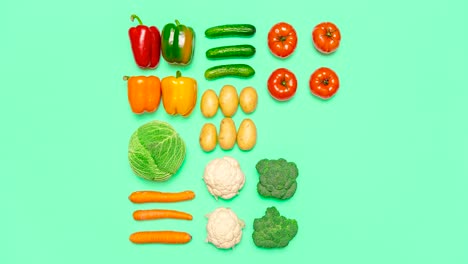 vegetables and fruits symmetry, stop motion, on a colored background, top view