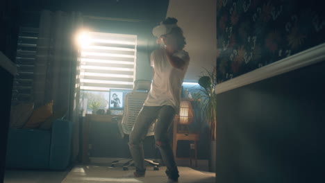 man playing vr dance game at home