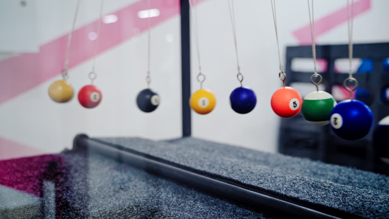 Balancing balls of Newton's cradle. Museum of Science