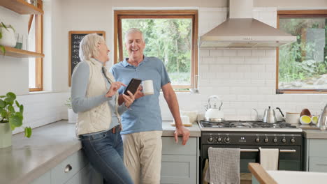 Phone,-coffee-and-senior-couple-in-kitchen