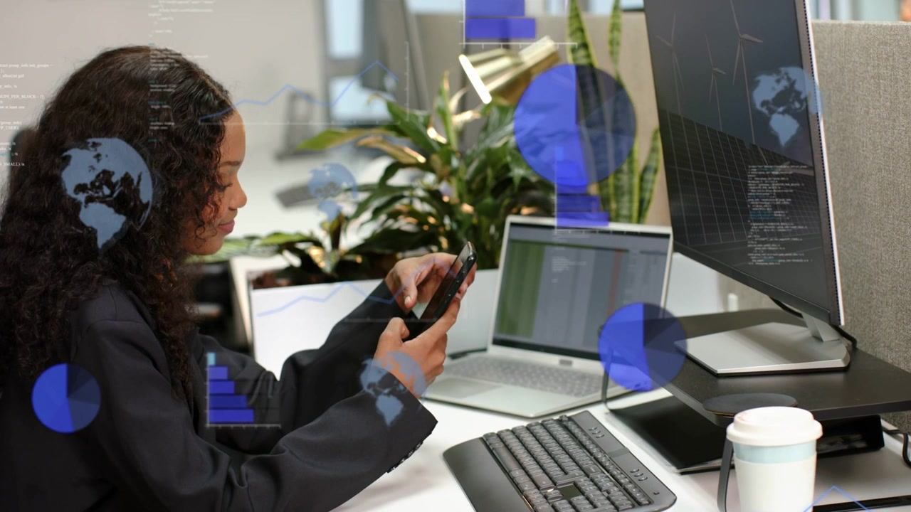 Office user tapping phone and causing blue data overlays expanding across desk showing analytics