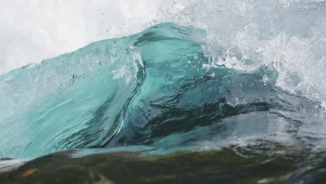 slow motion shot of whirling water of loen lake in norway at daytime