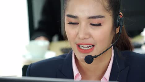 business people wearing headset working in office