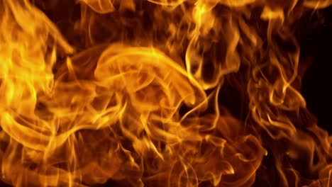 Flames-of-fire-on-black-background-in-slow-motion