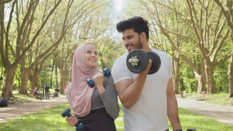 couple working out in a park