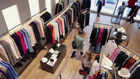 Inside a Clothing Store: Racks of Fashion Apparel and Jackets