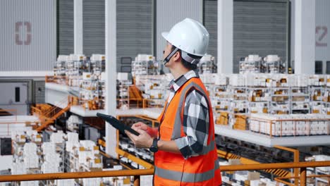 warehouse worker inspecting inventory