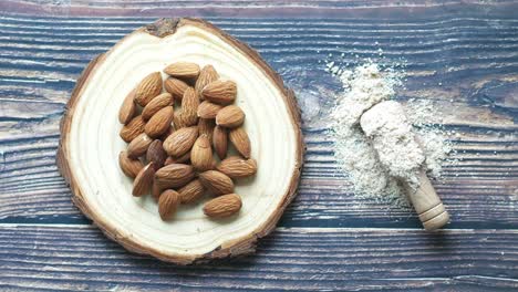 Almond-powder-and-almond-on-table