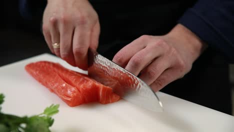 chef slicing salmon