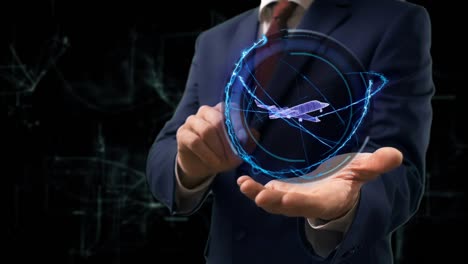 un hombre de negocios muestra un concepto de holograma de un avión 3d en su mano.