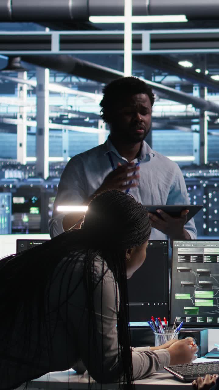 Vertical Video Server Hub Engineering Team Working Together, Using Node Tree Software