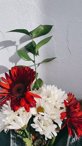 beautiful floral bouquet with red gerbera and white chrysanthemums