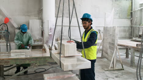 people working with marble