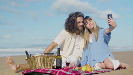 happy caucasian couple taking selfie