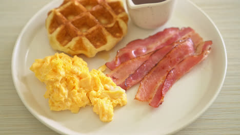 scrambled egg with bacon and waffle for breakfast