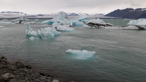 Glacier-Lagoon-in-Iceland-with-chunk-of-ice-floating-by