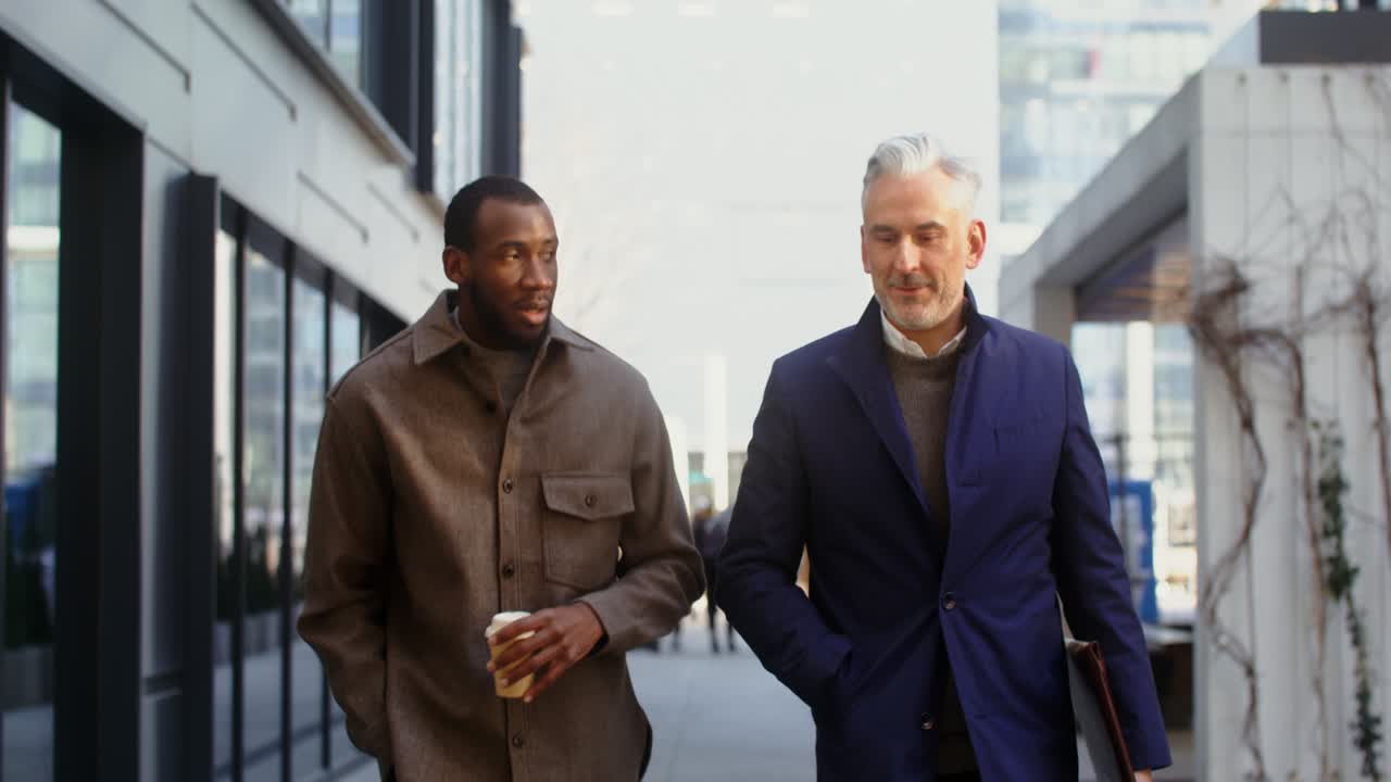 Businessmen Walking and Talking