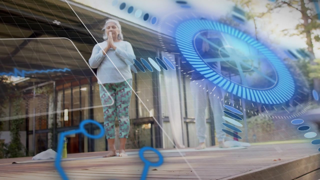 Senior woman holding prayer on deck, camera shifting while blue HUD drifting supporting meditation