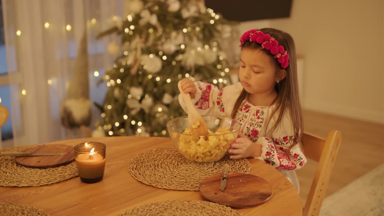 Mother and Daughter Preparing for Christmas Celebration